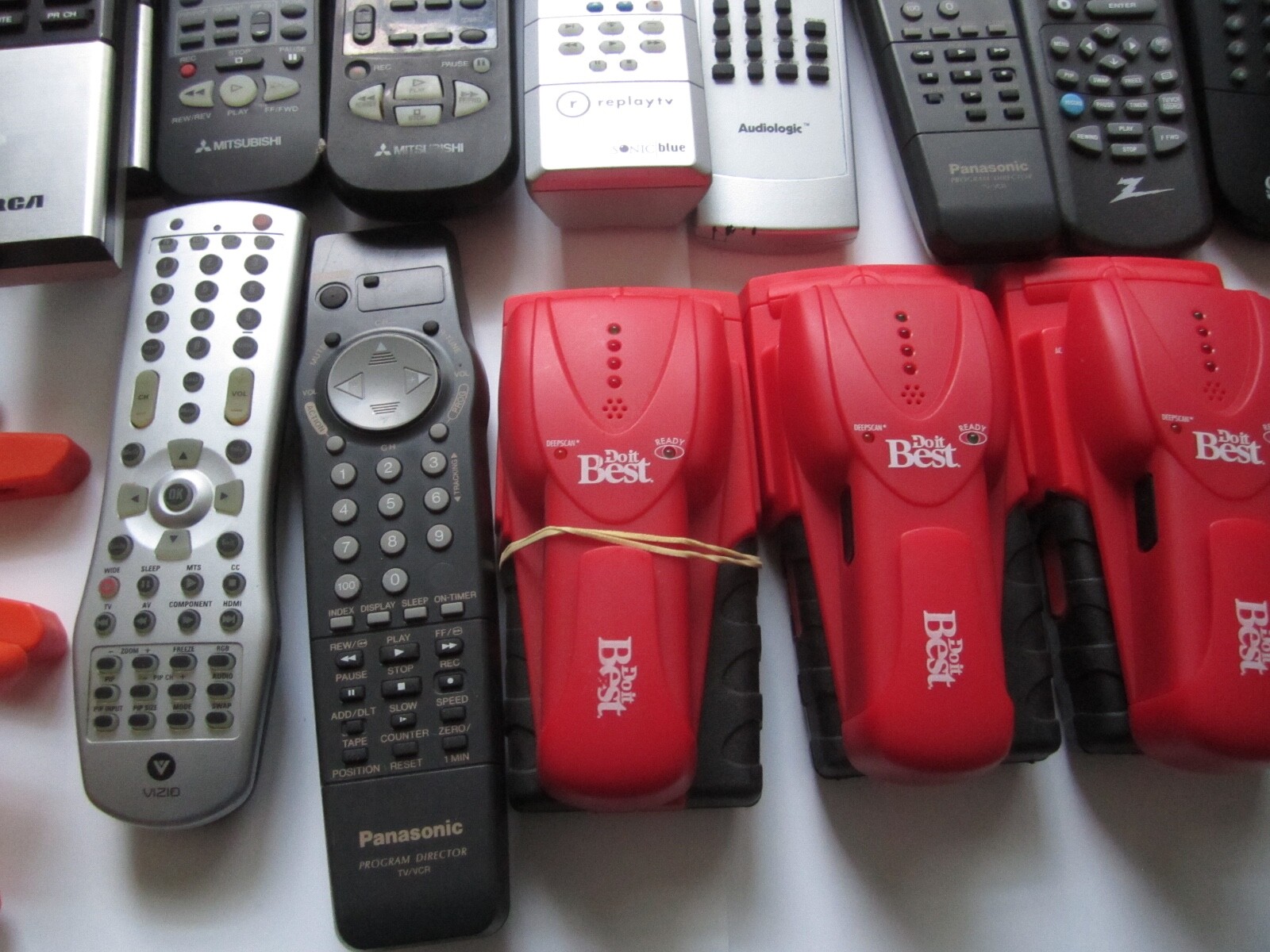 Mixed Lot of Electronics, remotes, Stud finder and more. S