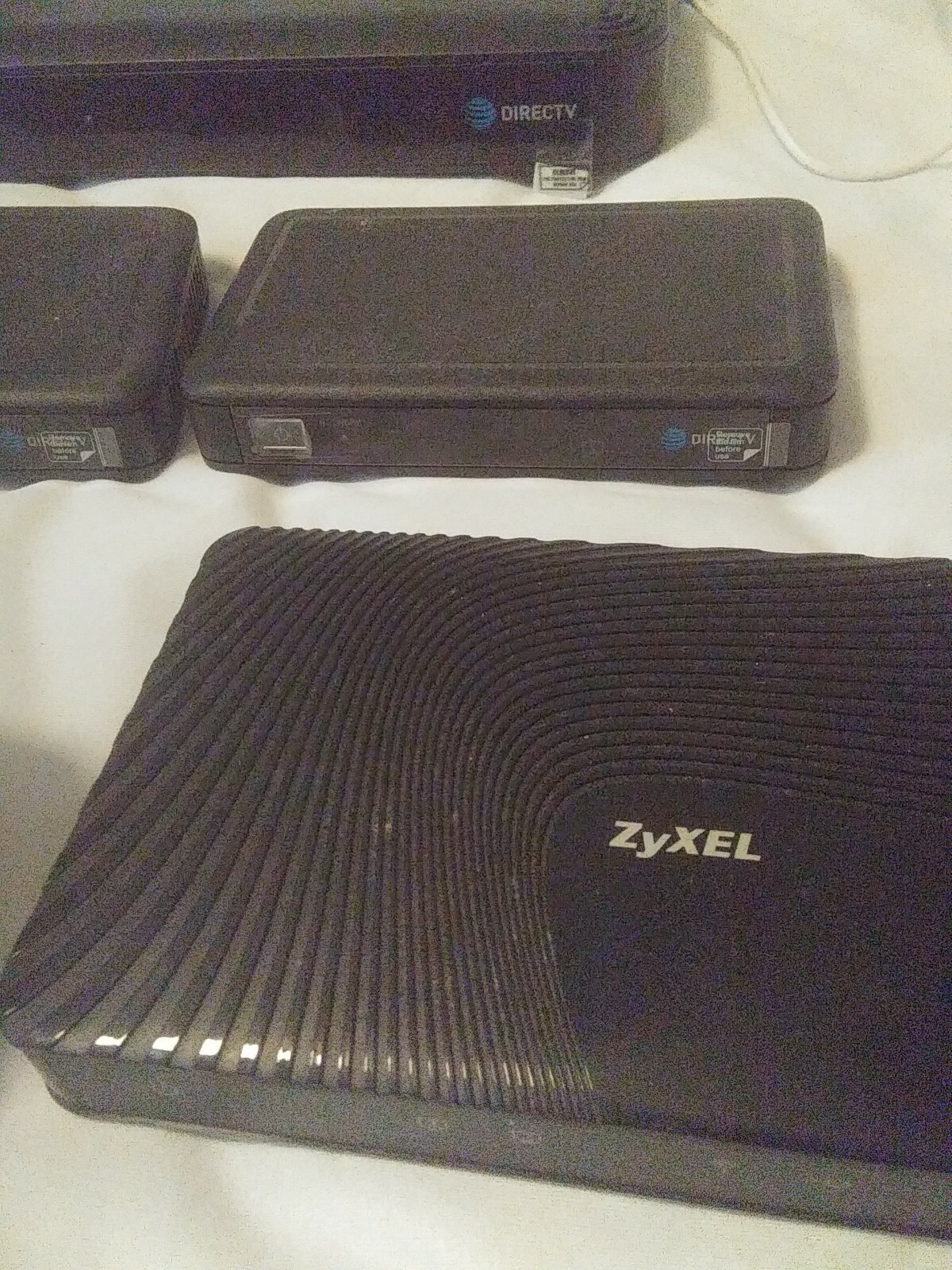 Mixed Lot of Electronics Direct TV, ZyXel, ADT