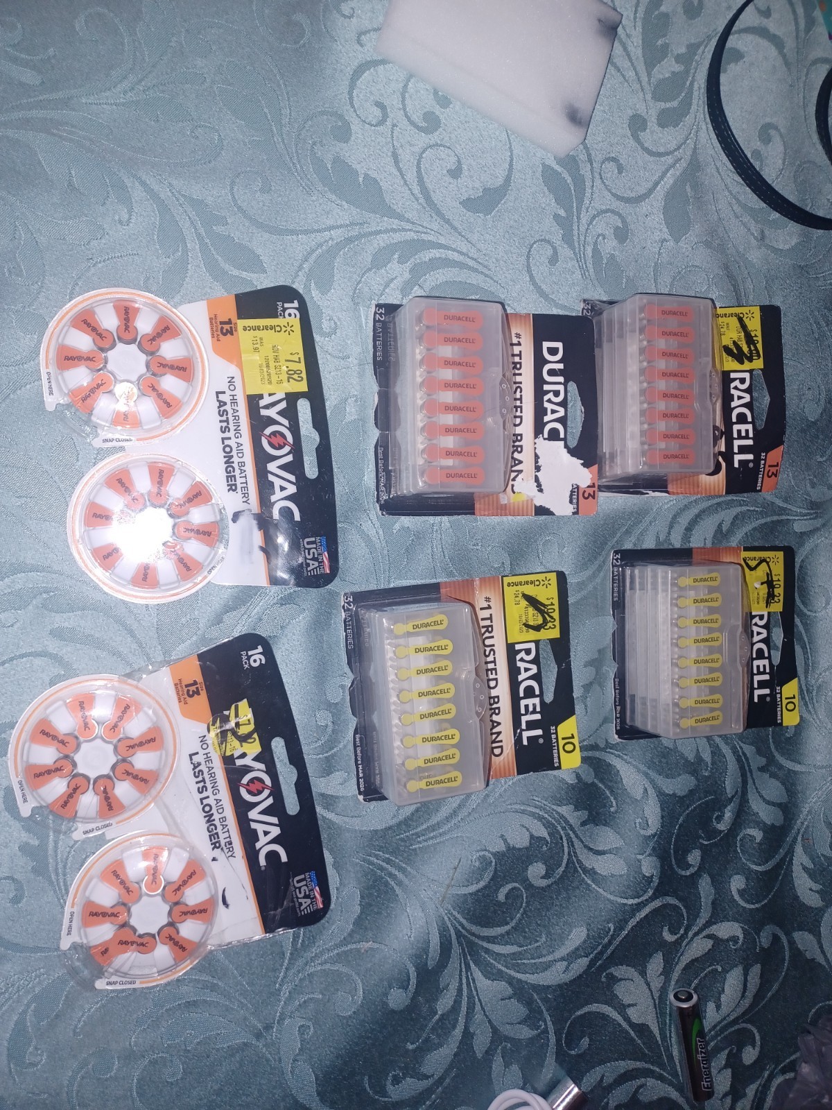Variety Of Opened And New Electronics Batteries Phones Cases And Ect
