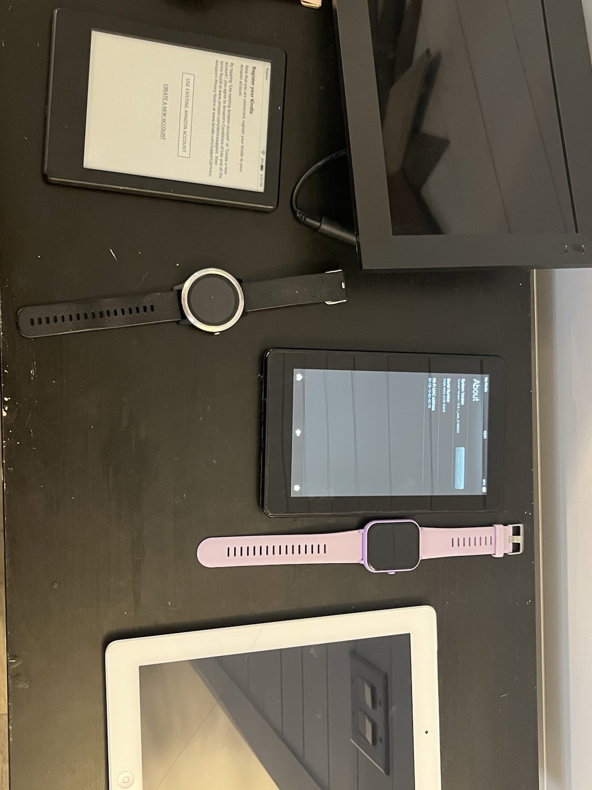 Electronics Lot Parts Repair Apple iPad Fitbit Versa 2 Garmin Kindle Fire W10F