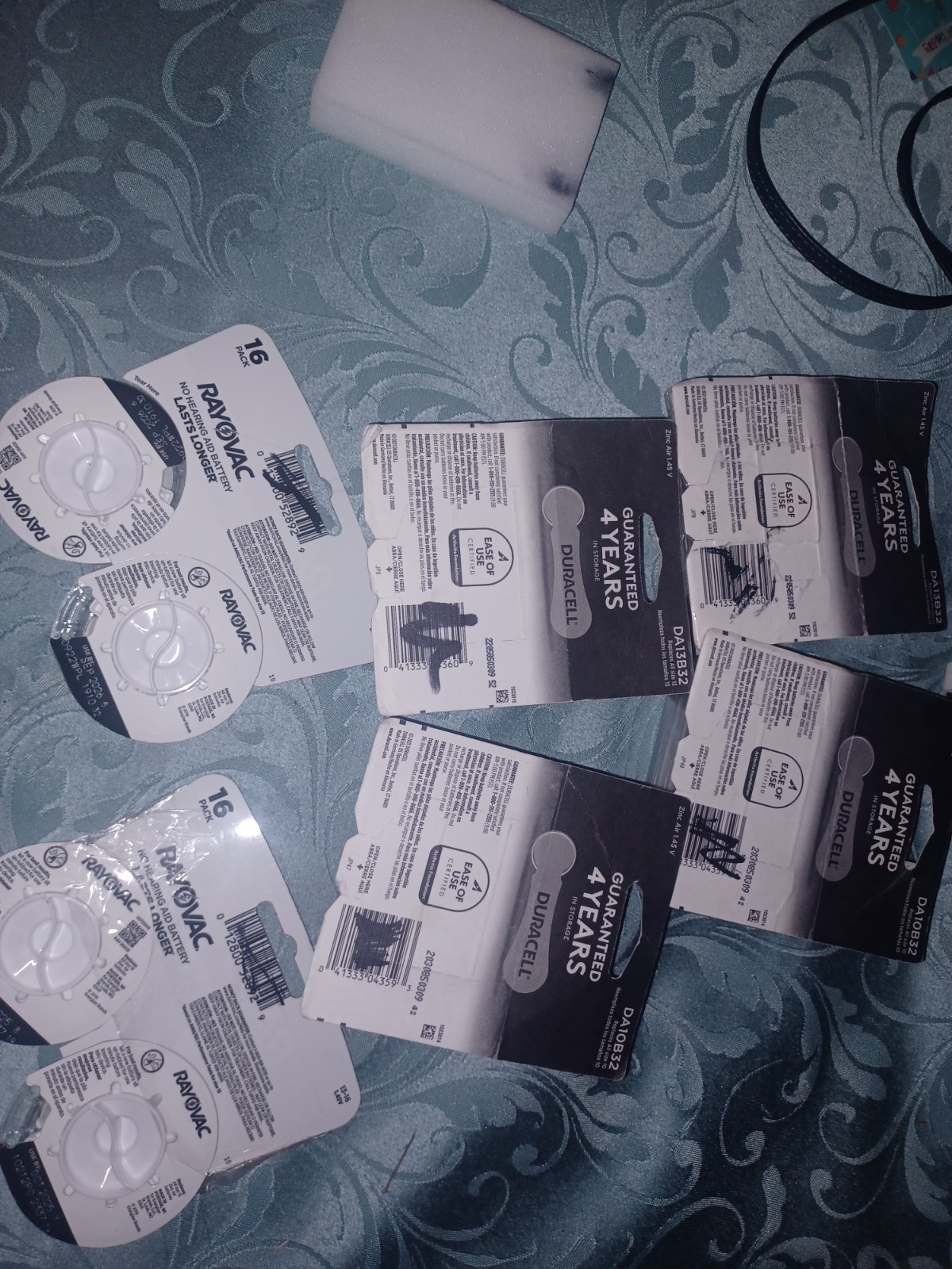 Variety Of Opened And New Electronics Batteries Phones Cases And Ect