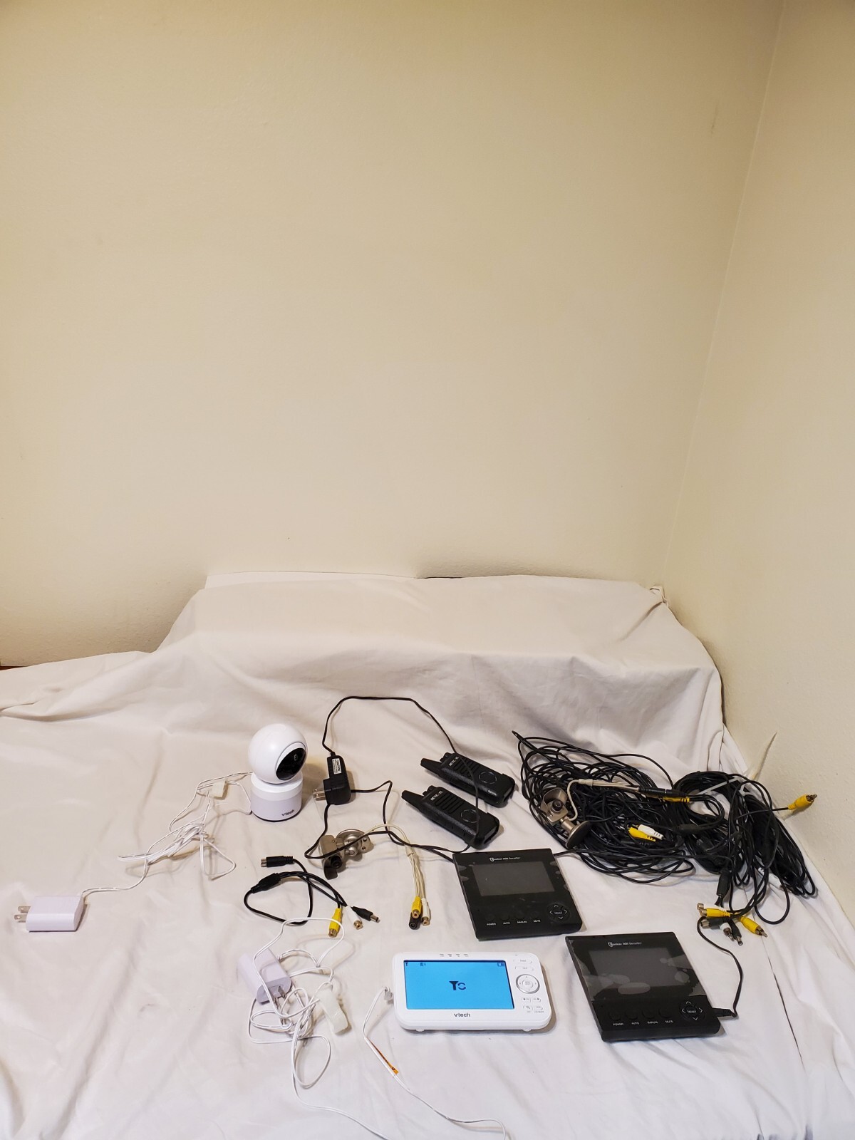 “Mixed Lot: VTech Baby Monitor, Surveillance Cameras, Walkie-Talkies, and…