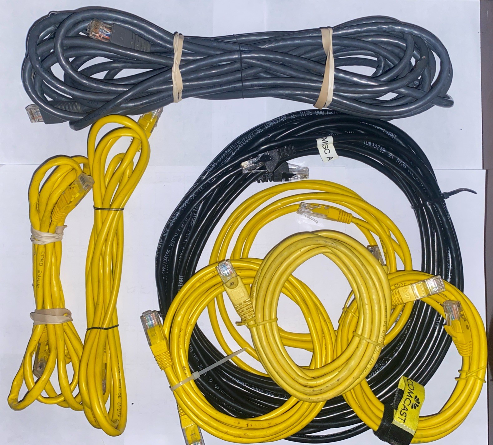 lot of power cords, chargers random miscellaneous electrical