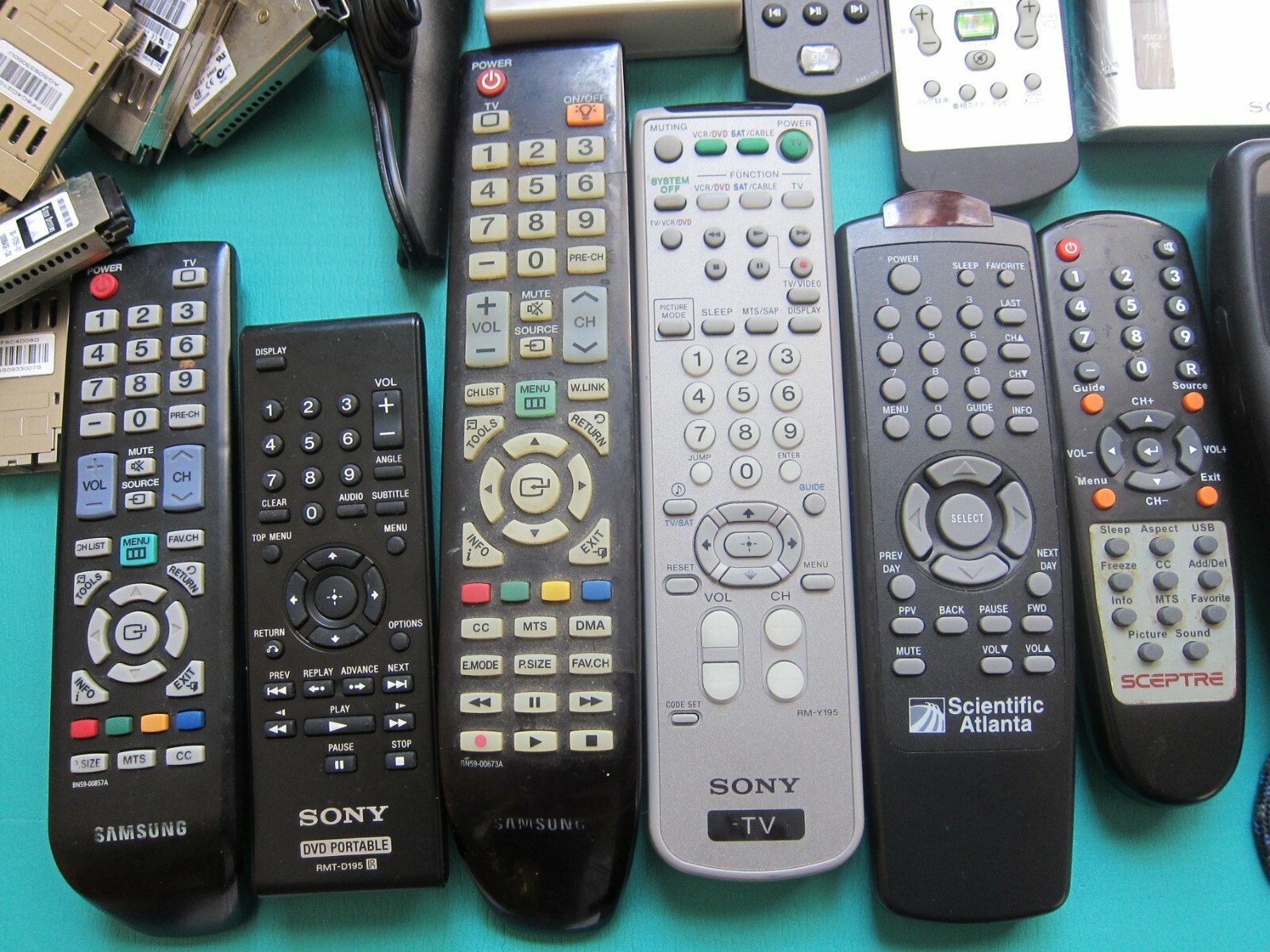 Mixed Lot of Electronics remote controls, mouse, Cisco Etheret Modules, etc, Z