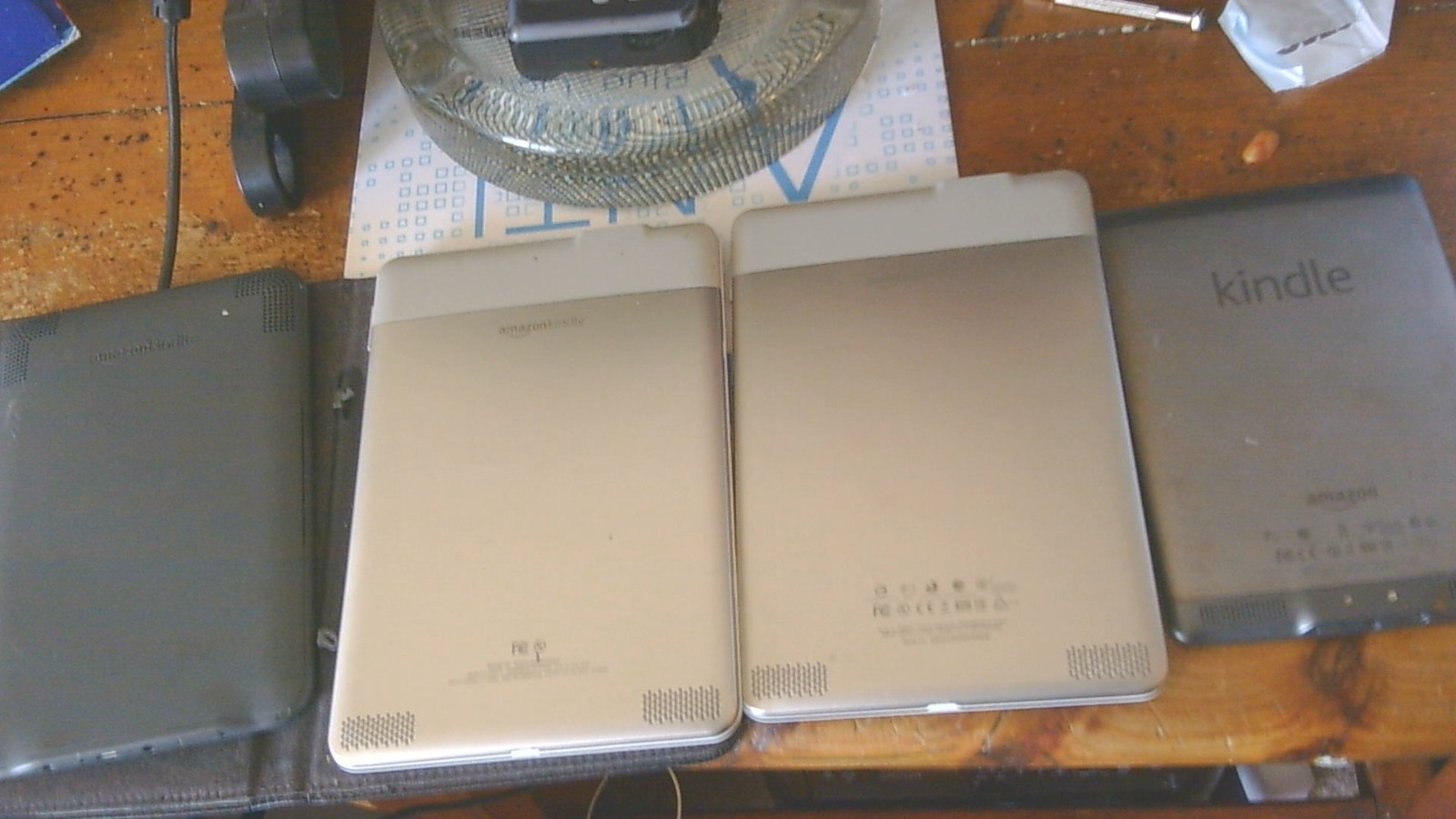 lot of 4 amazon kindles models D01200 D00701 D00511 D00901