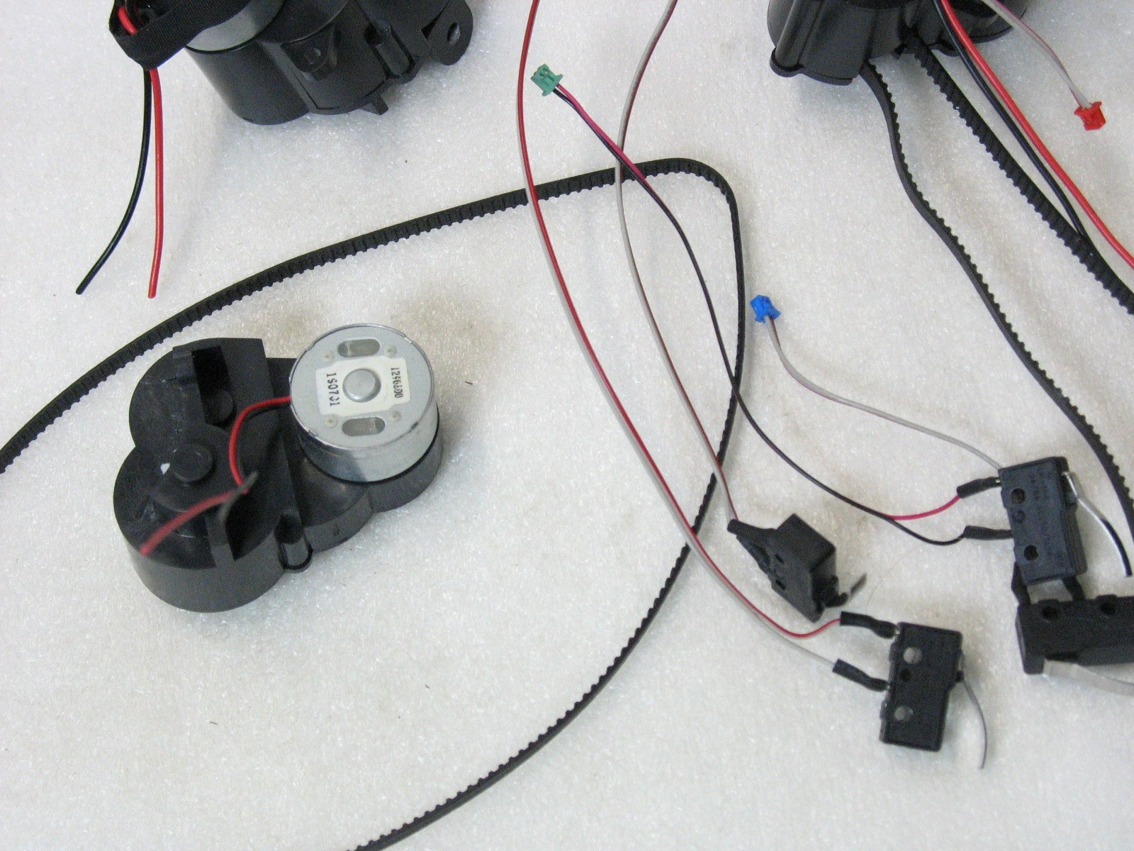 Lot of electronics. 12 Volt Motors, Micro Switches and 2 Timing Belts