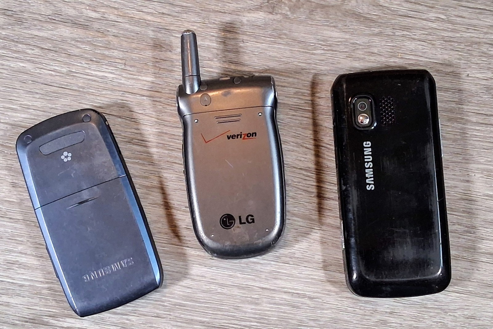Vintage Cellphone Lot (3) Samsung & LG (FOR PARTS REPAIR OR MOVIE PROPS)