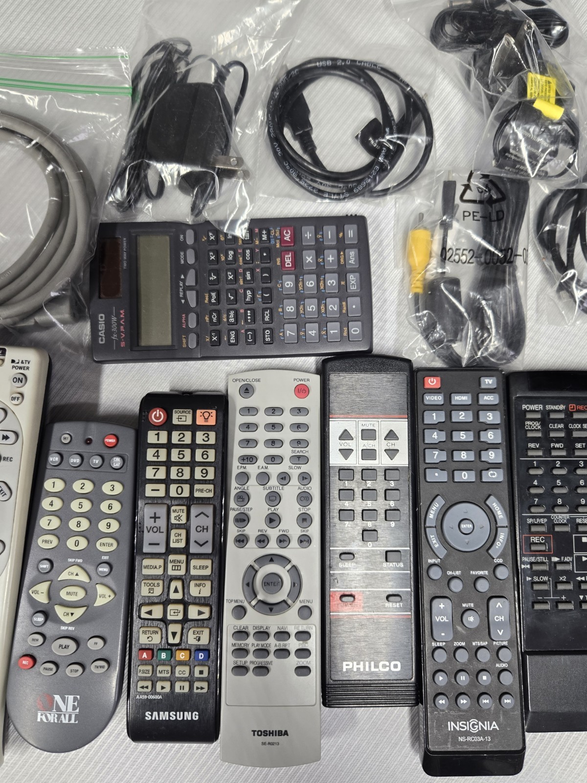 Mixed Electronics Lot Of 24 REMOTE CONTROLS, CABLES, ADAPTERS, Etc. Over 4 Lbs
