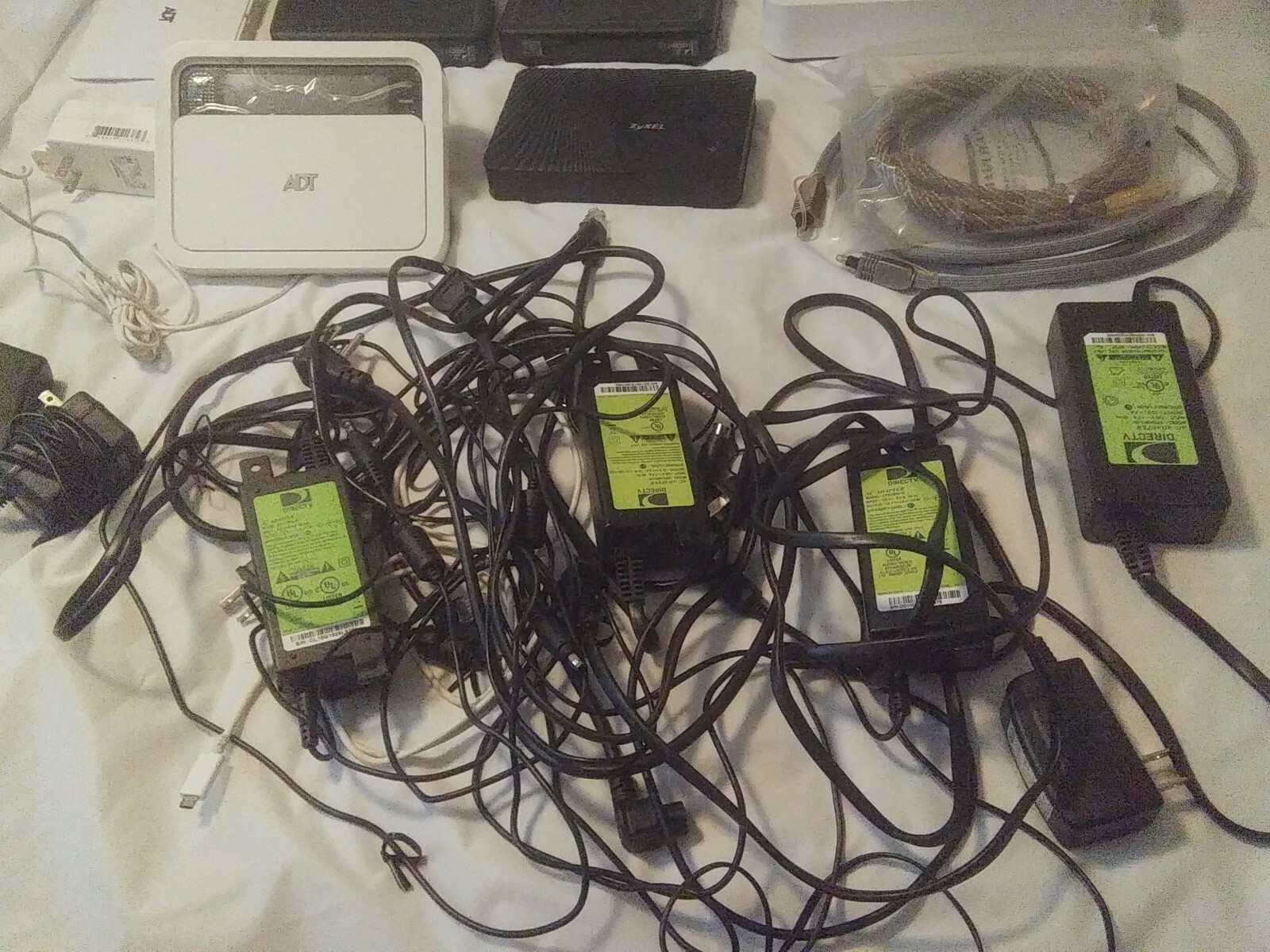 Mixed Lot of Electronics Direct TV, ZyXel, ADT
