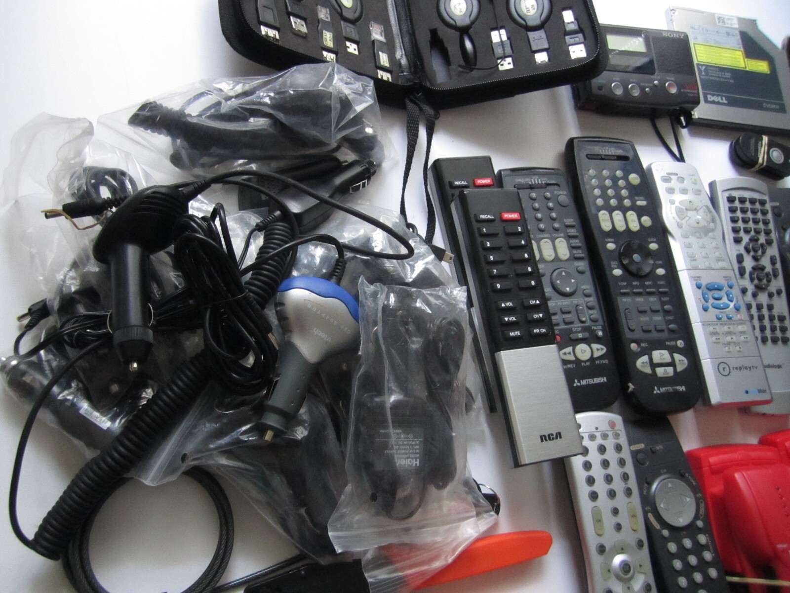 Mixed Lot of Electronics, remotes, Stud finder and more. S