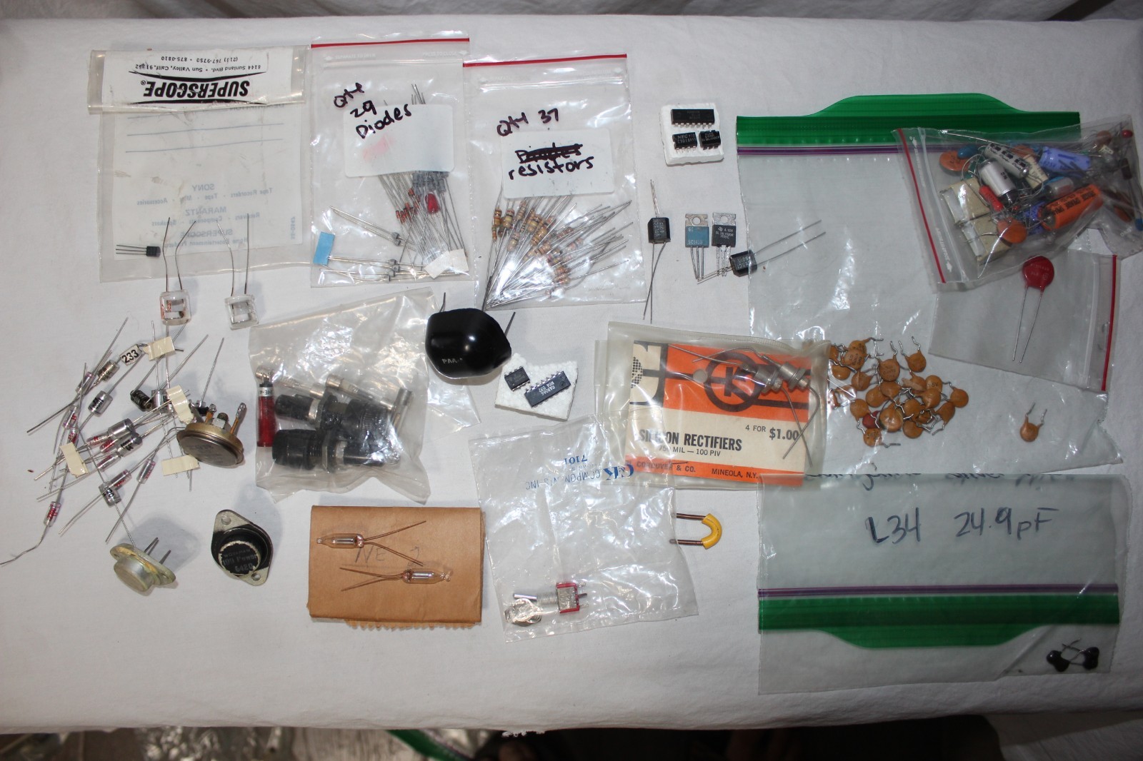 Transistors Diodes Resistors Capacitors Photocell ICs mixed electrical parts