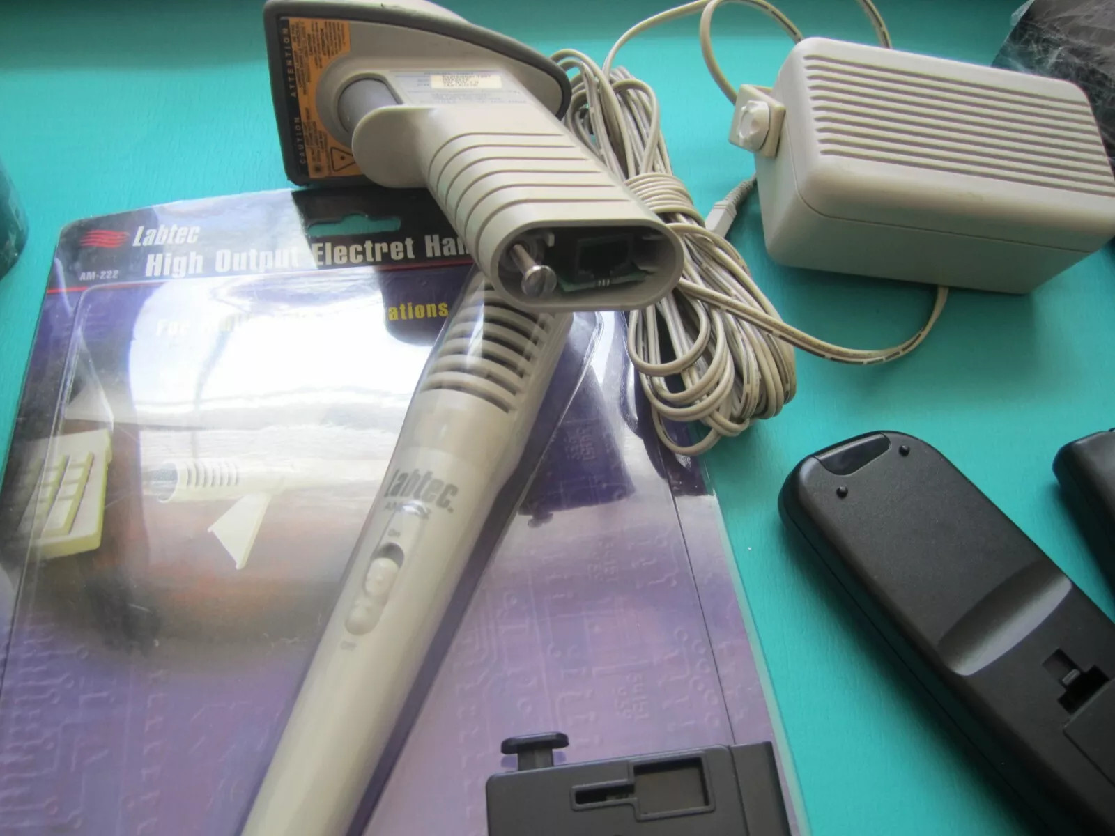 Mixed Lot of Electronics speakers, remote controls, batteries, and more W