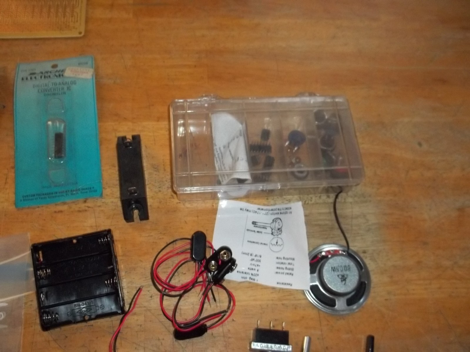 lot of electronics components, resistors, capacitors, relays, transistors, etc.