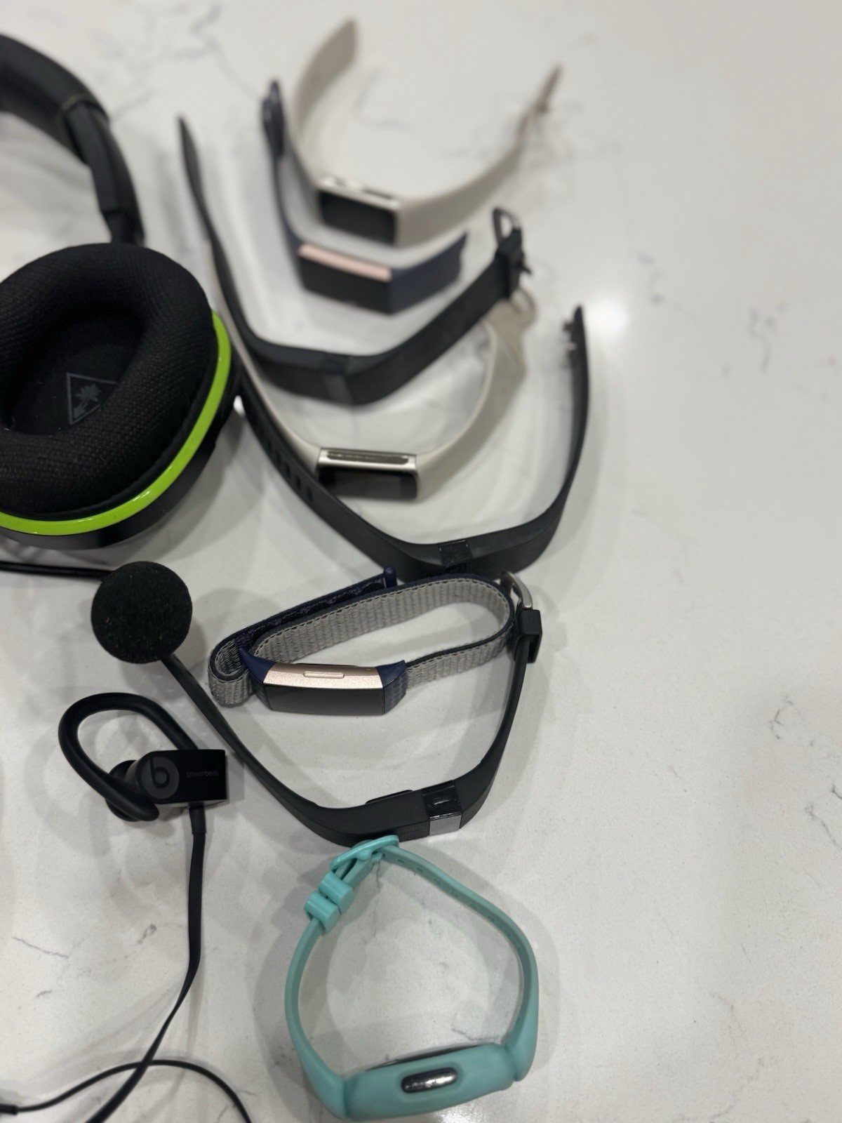 Lot Of Electronic Devices UNTESTED – Watches, Headphones, Earbuds, Neck Band