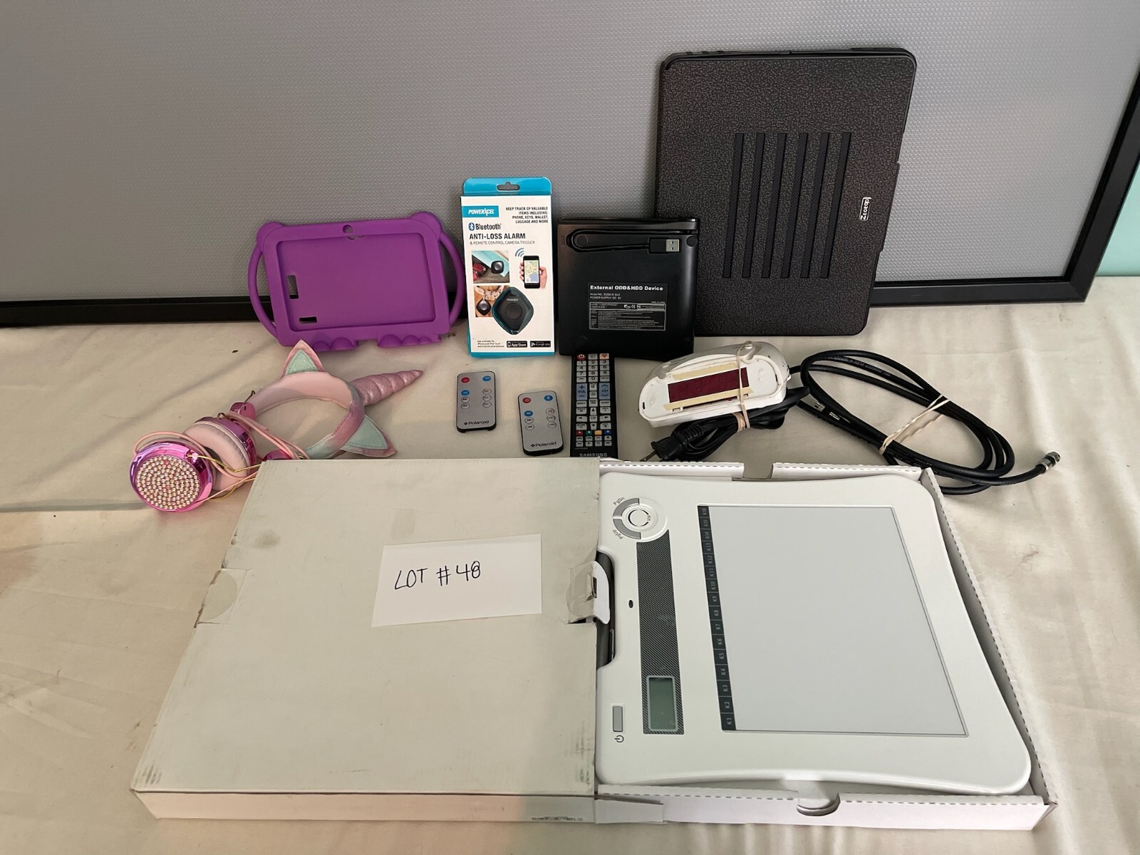 Lot of 11 Electronic Accessories Untested – Lot #48 – Cases Alarm Remotes & More