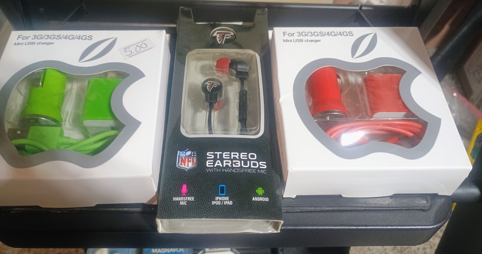 iPhone chargers, adapters, case, earbuds, and a mini display port to HDMI