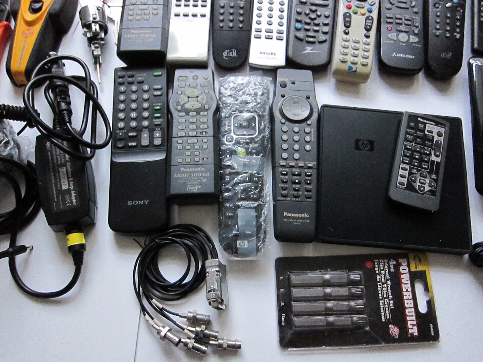 Mixed Lot of Electronics, remotes, Stud finder and more. T