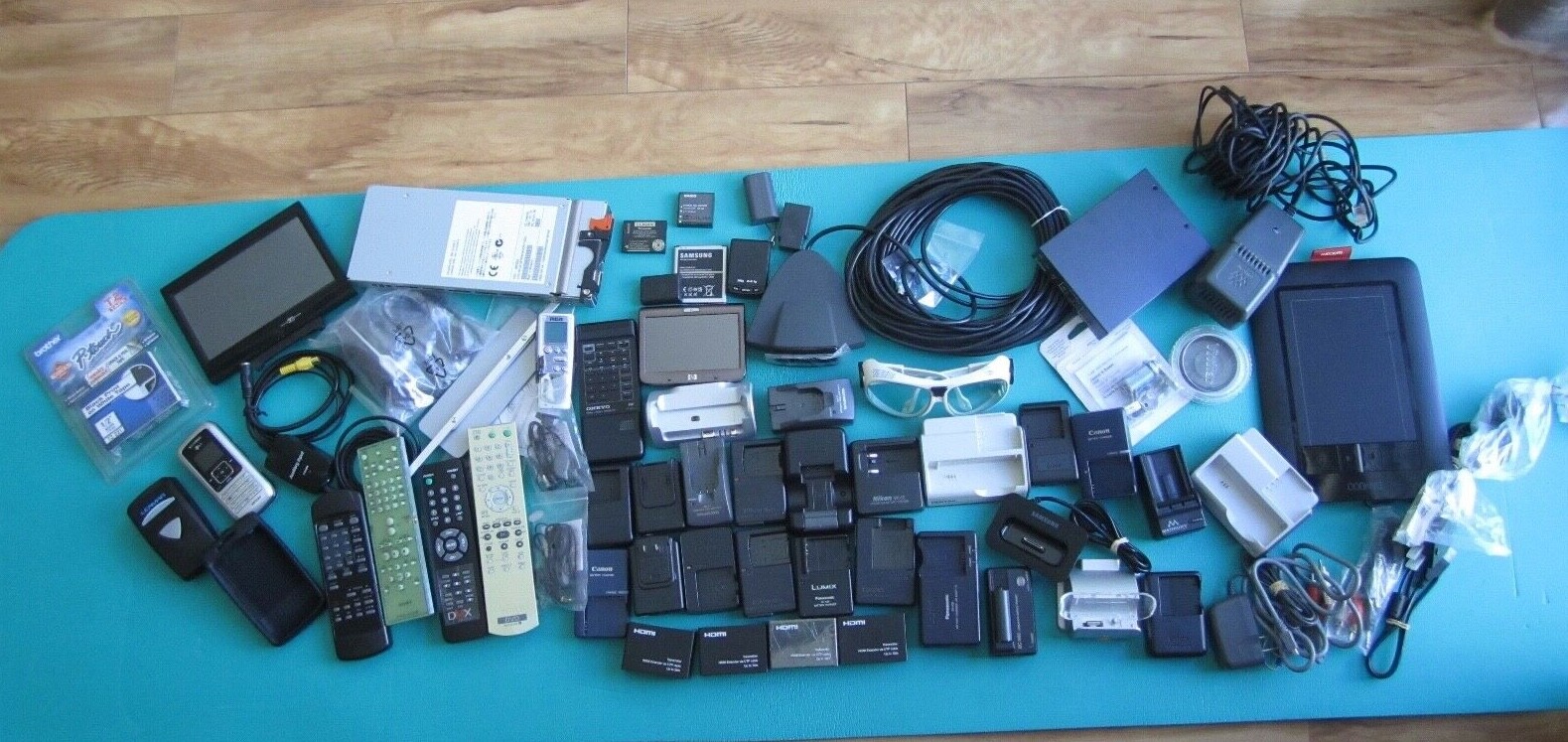 Mixed Lot of Electronics, remotes, battery chargers etc. L