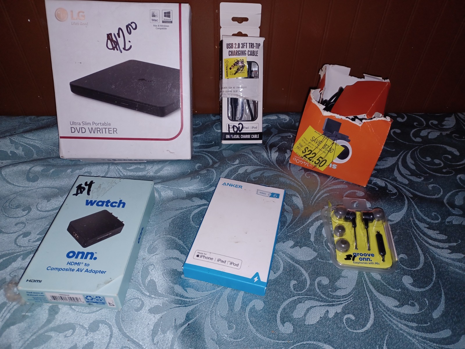 Variety Of Opened And New Electronics Batteries Phones Cases And Ect