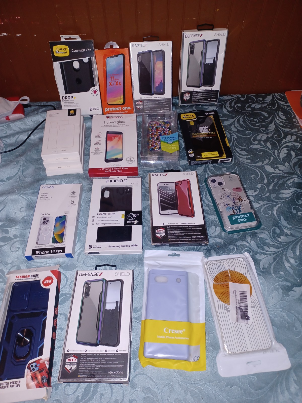 Variety Of Opened And New Electronics Batteries Phones Cases And Ect