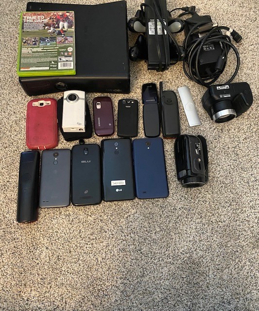 Lot of Electronic Devices: Xbox, Samsung, Nokia, BLU, LG, Blackberry, Apple.
