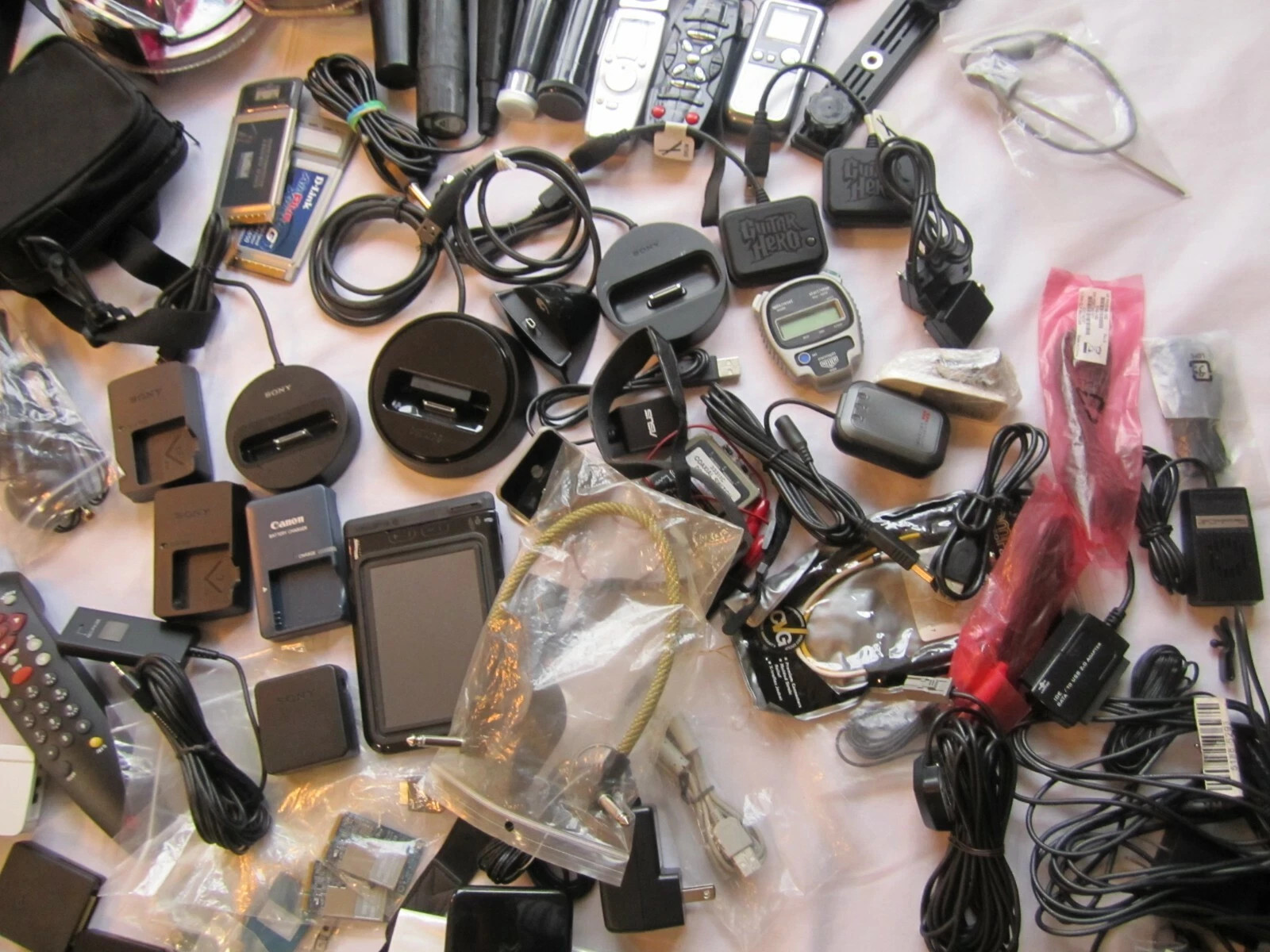 Mixed Lot of Electronics, remotes, battery chargers etc. L