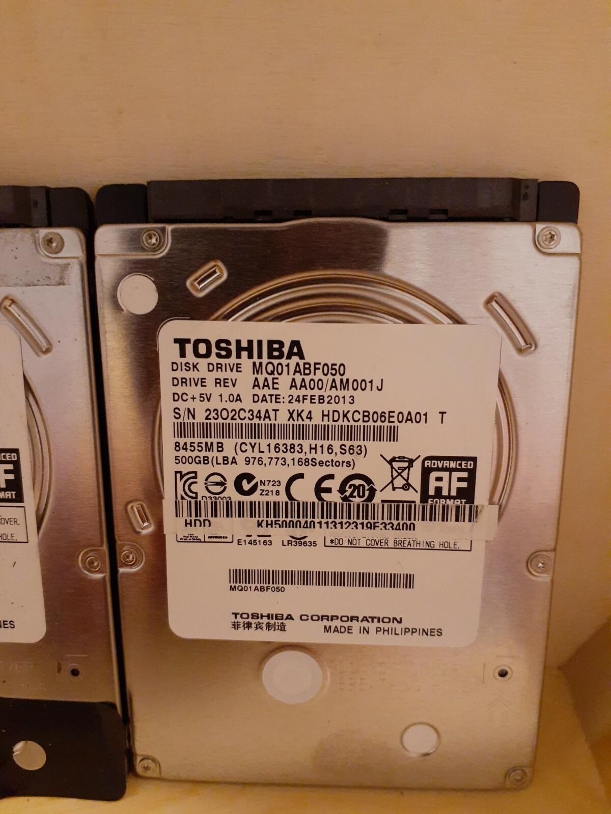 (2) Toshiba Hard Drives 500GB 2.5″ MQ01ABF050 AA00 AM0B1J AA00N AM001J DOD WIPED