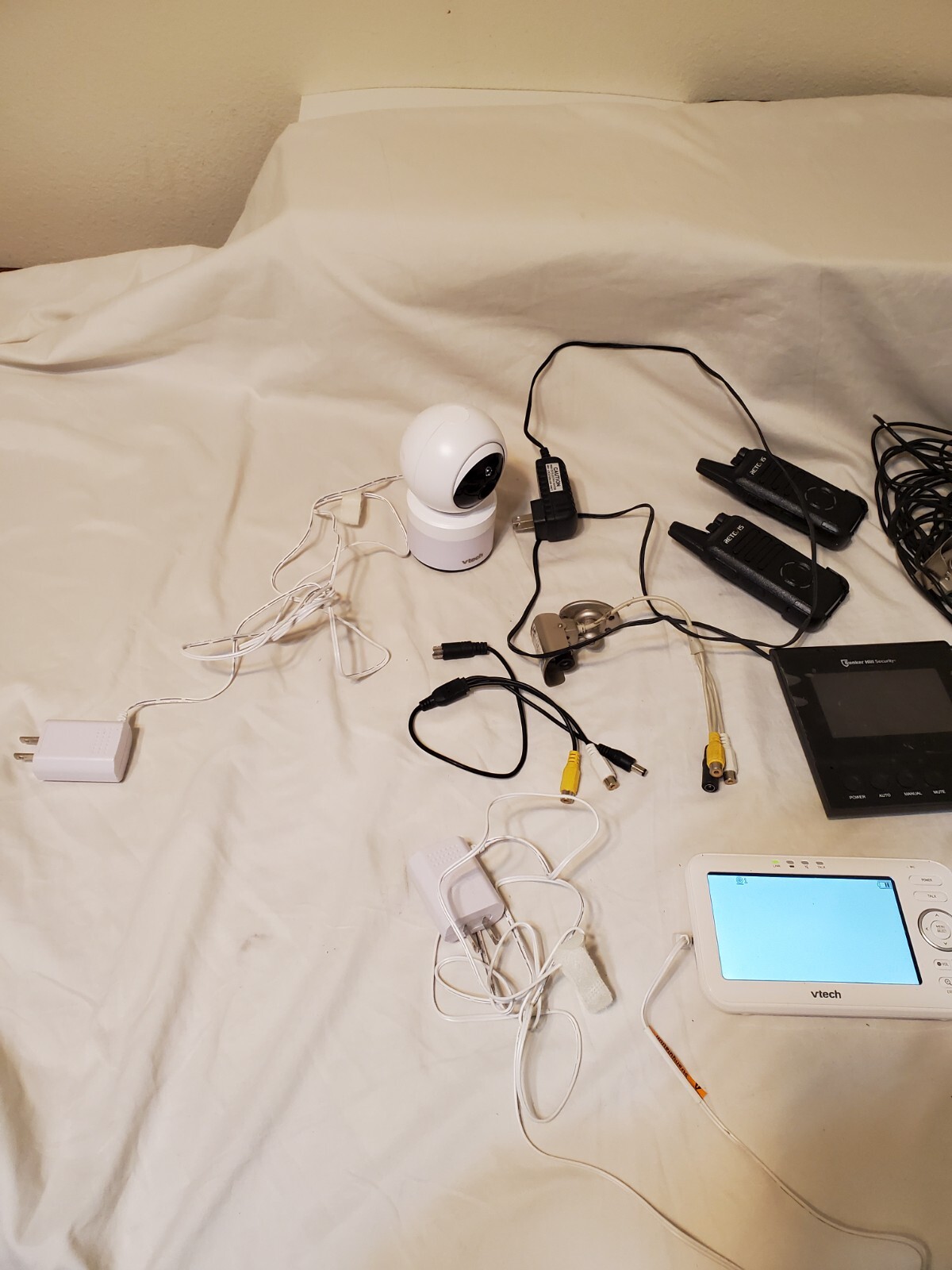 “Mixed Lot: VTech Baby Monitor, Surveillance Cameras, Walkie-Talkies, and…