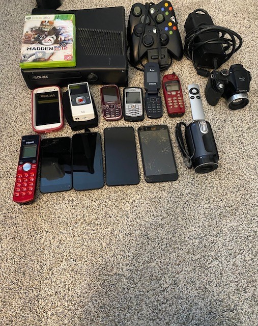 Lot of Electronic Devices: Xbox, Samsung, Nokia, BLU, LG, Blackberry, Apple.