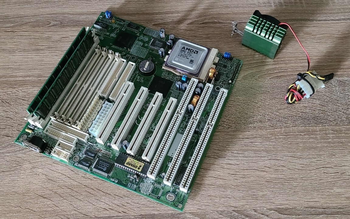 Tekram P5T30-B4E Rev. 1.1 Socket 7 with AMD K6 233ANR CPU memory cooler