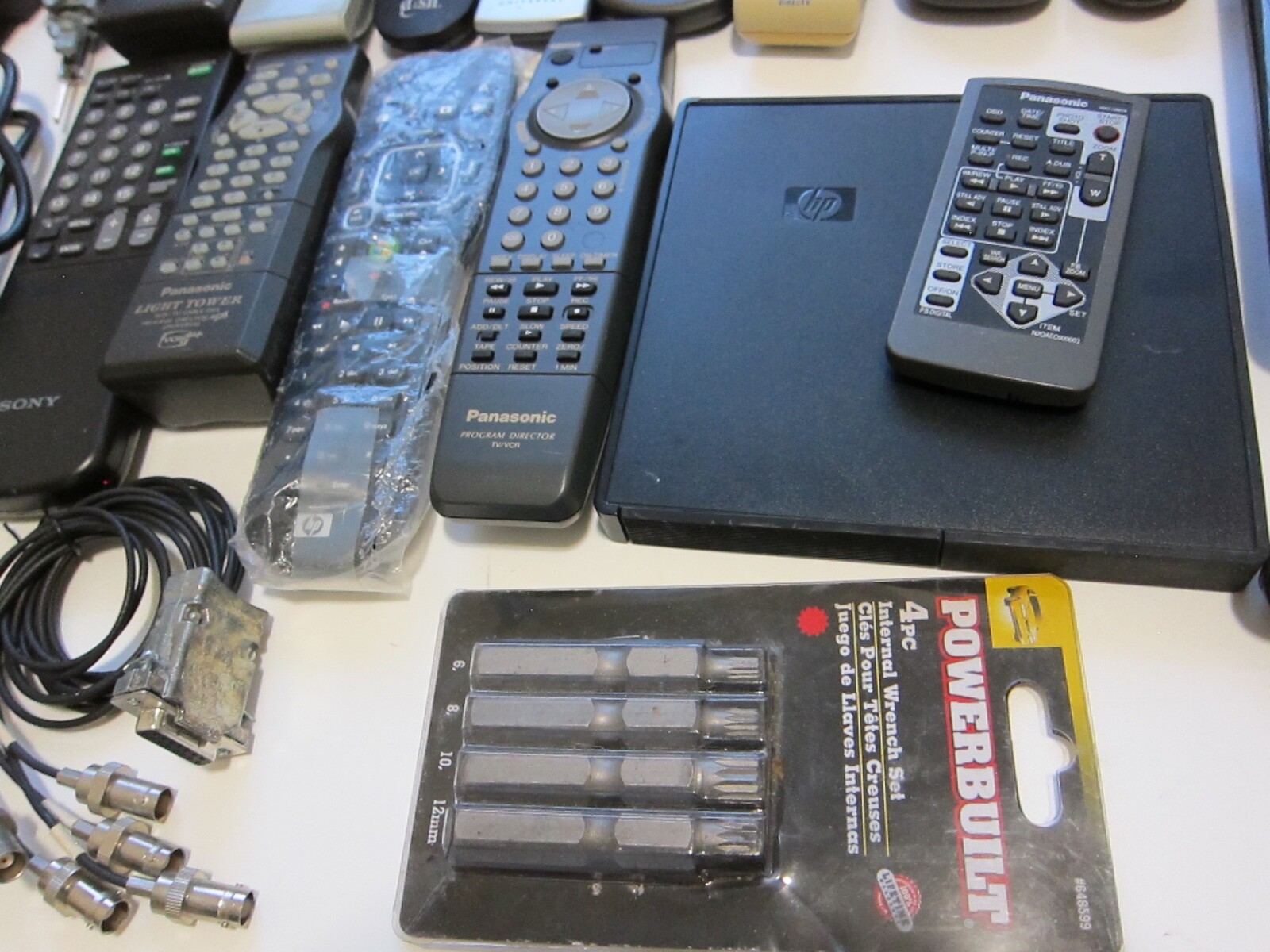 Mixed Lot of Electronics, remotes, Stud finder and more. T