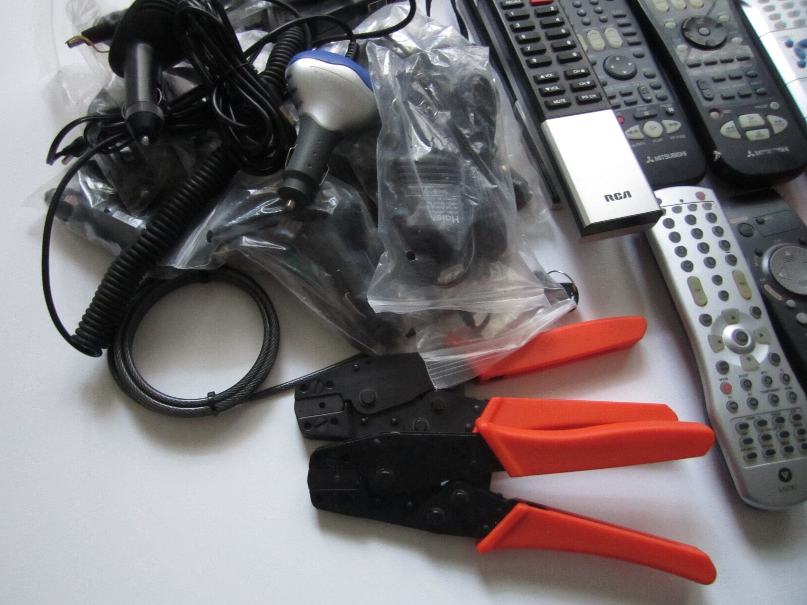 Mixed Lot of Electronics, remotes, Stud finder and more. S