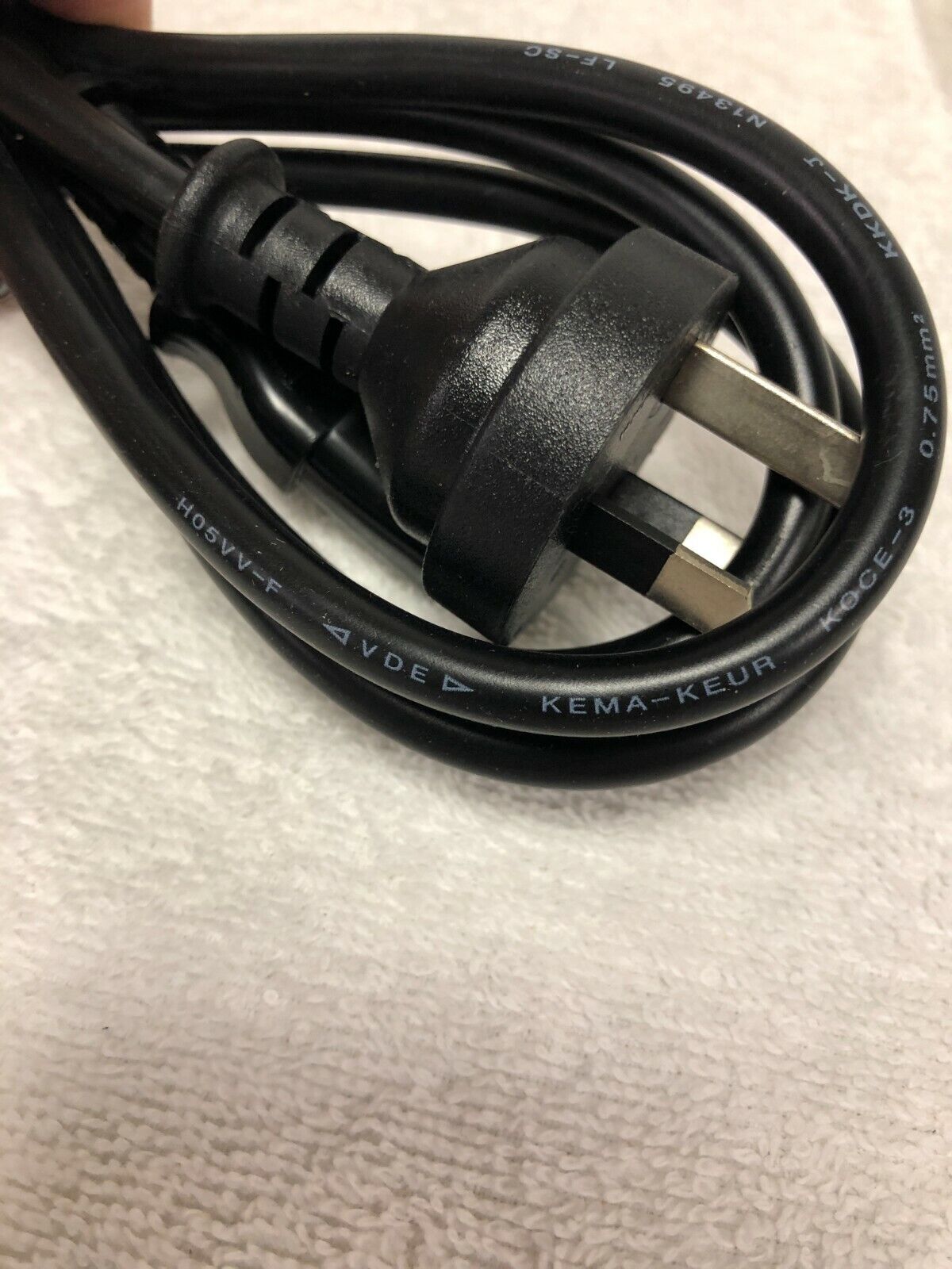 Pair of Australian power cords (one new, one used)