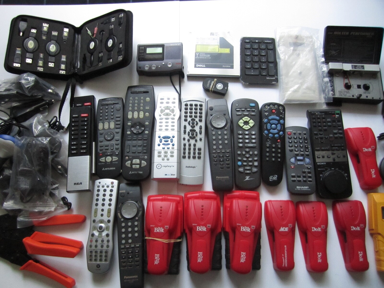 Mixed Lot of Electronics, remotes, Stud finder and more. S