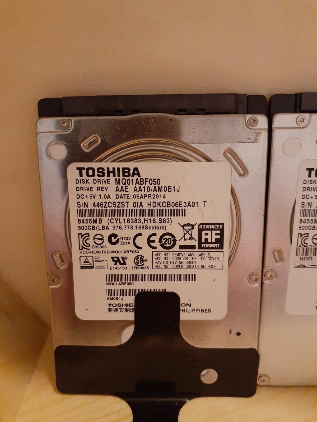 (2) Toshiba Hard Drives 500GB 2.5″ MQ01ABF050 AA00 AM0B1J AA00N AM001J DOD WIPED