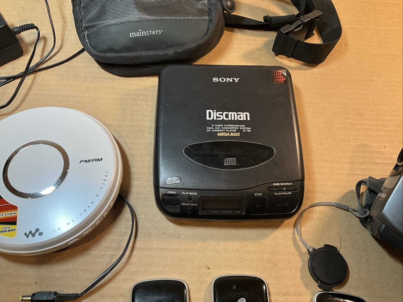 Vintage Electronic Lot- Trac Phones, Cam Corder, Walkmans And Spirit 600 Camera