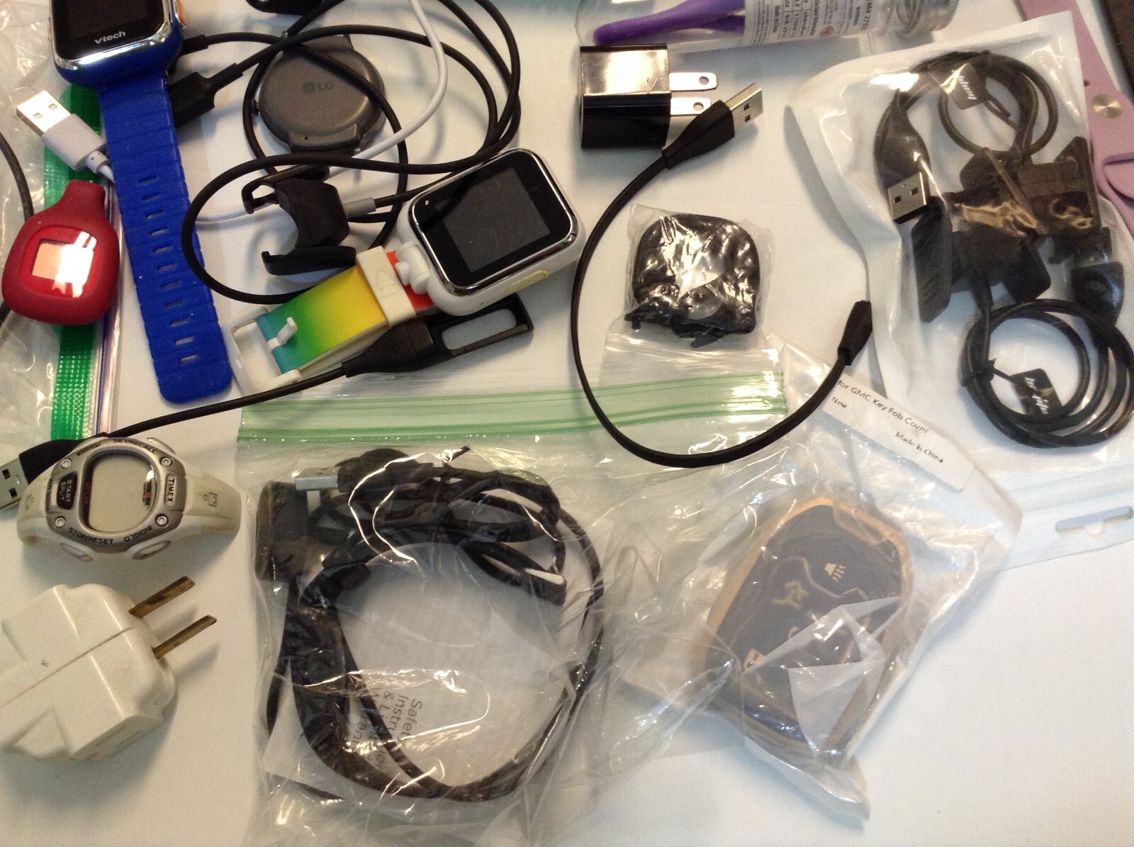 HUGE lot AS IS UNTESTED USED activity trackers bands chargers cases cords Lot-2