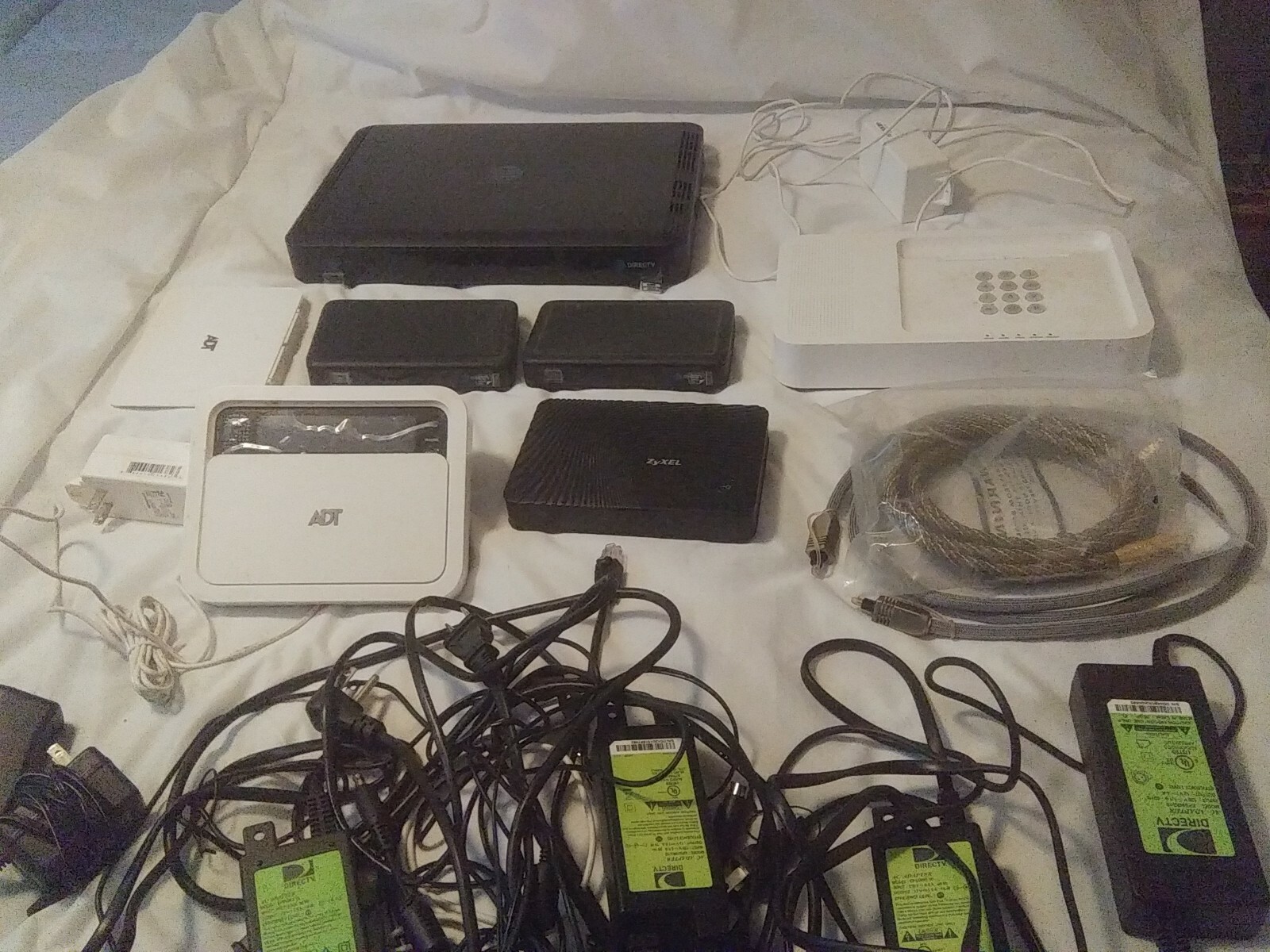 Mixed Lot of Electronics Direct TV, ZyXel, ADT