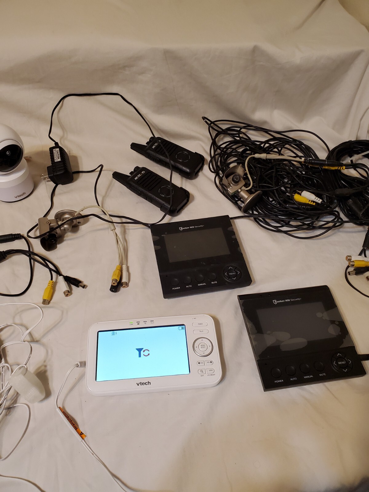 “Mixed Lot: VTech Baby Monitor, Surveillance Cameras, Walkie-Talkies, and…