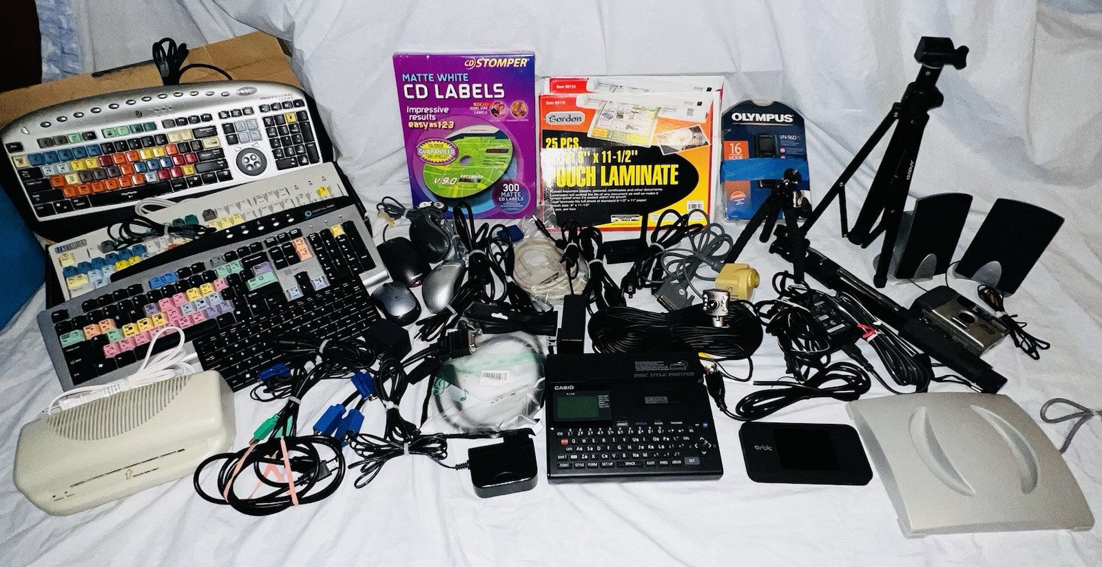 LOT OF ASSOCIATED ￼ELECTRONICS, KEYBOARDS, MOUSE, SPEAKERS, LAMINATER, CAMERAS