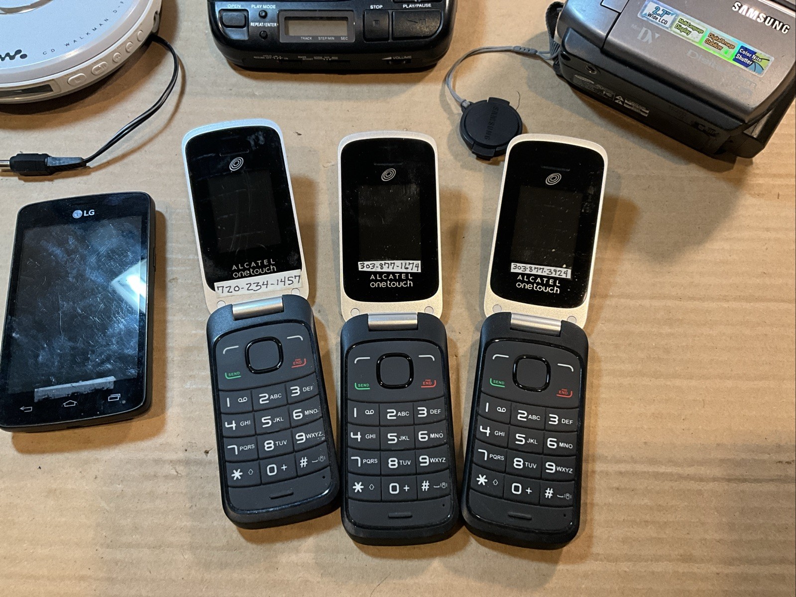 Vintage Electronic Lot- Trac Phones, Cam Corder, Walkmans And Spirit 600 Camera