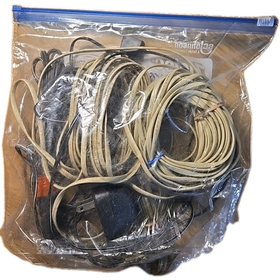 Bag Of Random Phone Lines.And Random Chargers All In One Bag. Used