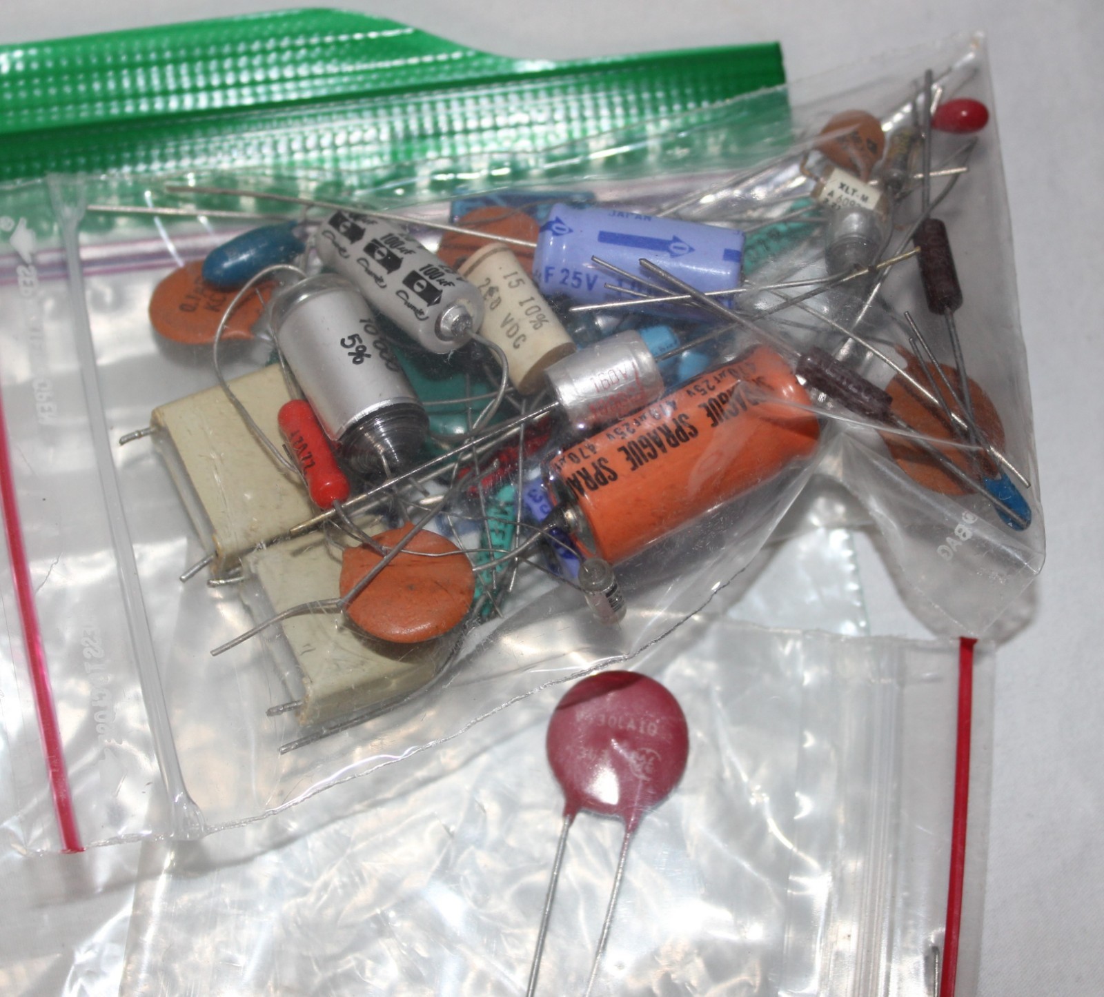 Transistors Diodes Resistors Capacitors Photocell ICs mixed electrical parts