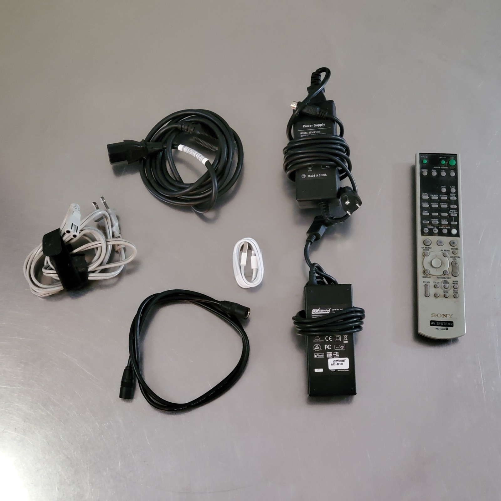 Lot of 7 – Various Cables, Adapters, and 1x Sony Remote Control