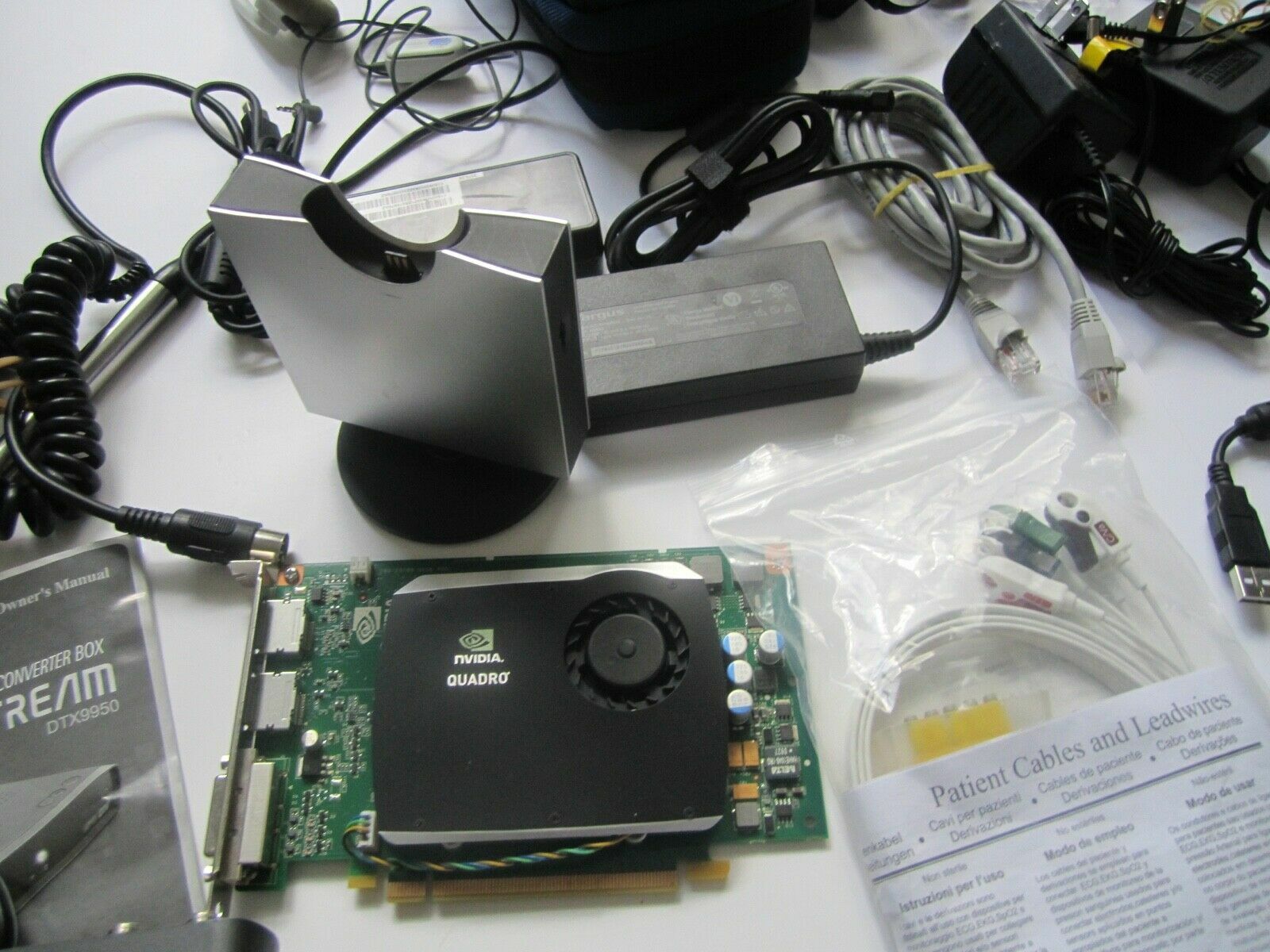 Mixed Lot of Electronics, remotes, AC Adapters, GPS & more….. NO RETURNS M