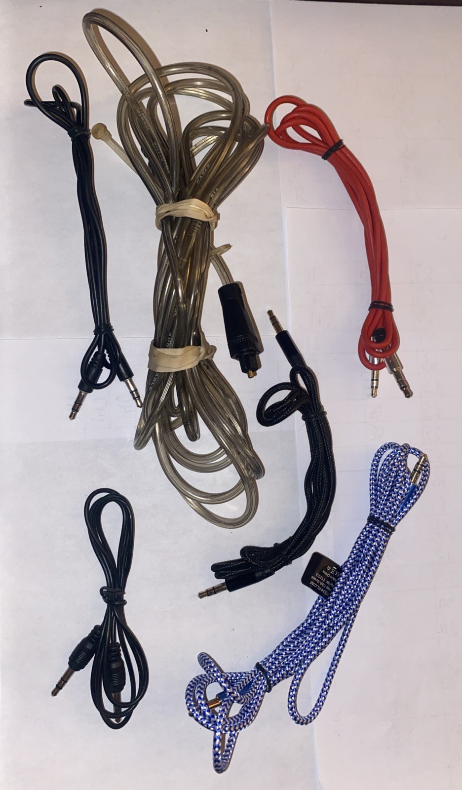 lot of power cords, chargers random miscellaneous electrical