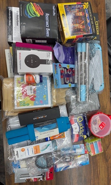 “Mixed Merchandise Lot: Fitness Bands, Puzzles, Wireless Headphones & Games”
