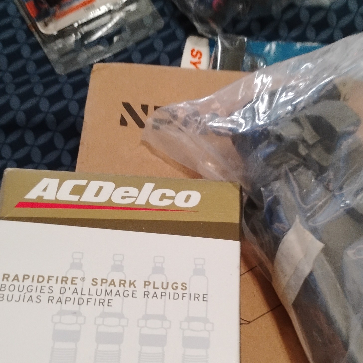A-Premium, ACDelco, Sylvania Mixed Lot: Bulbs, Spark Plugs, Ignition Coils