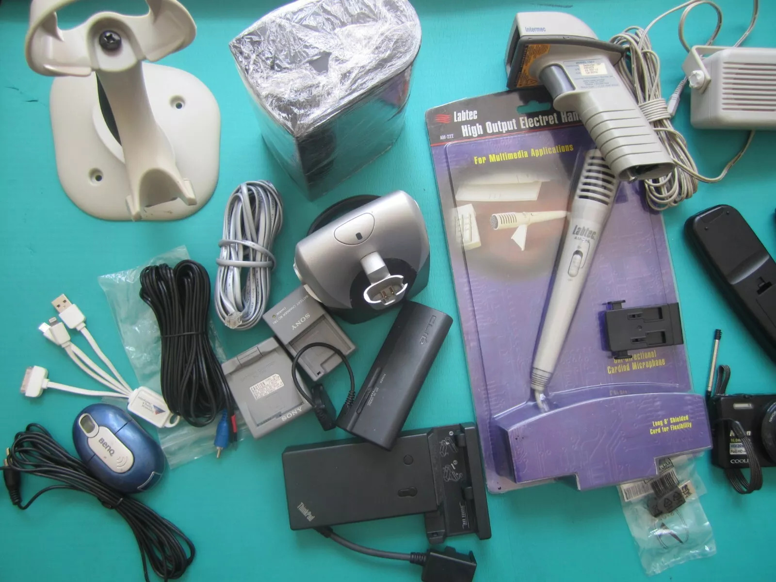 Mixed Lot of Electronics speakers, remote controls, batteries, and more W