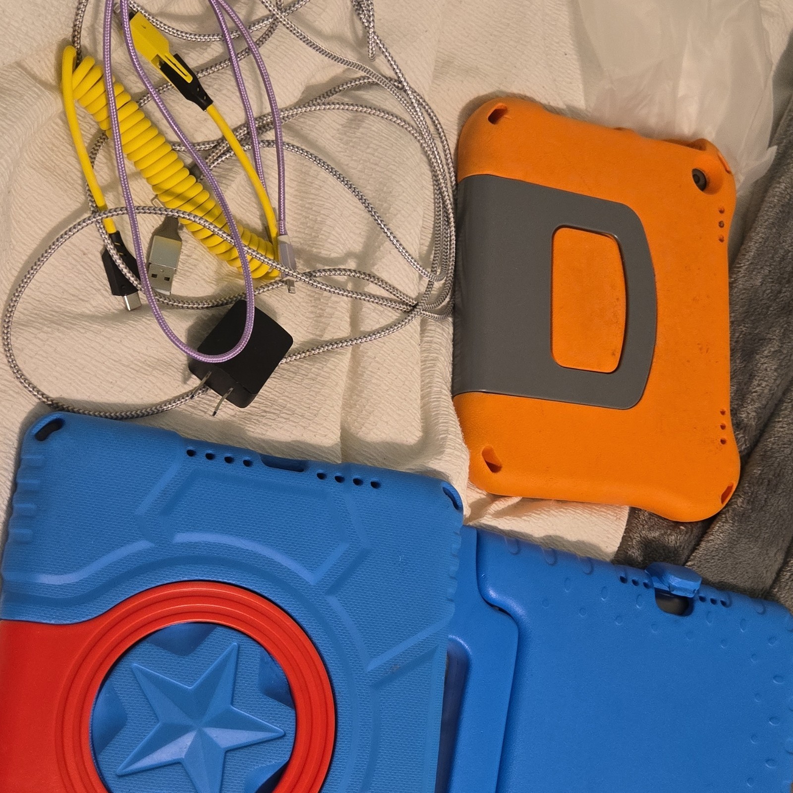 Lot of 3 Tablets – 2 Apple iPads + Amazon Fire Tablet – With Chargers & Cases